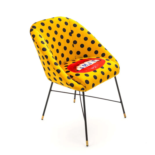 SHIT - Upholstered fabric chair with armrests.