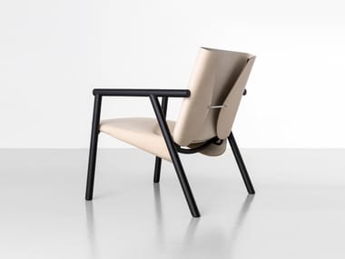1085 EDITION - Tanned leather easy chair with armrests (Request Info).