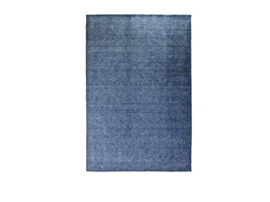 NEXT 999 - Solid-color rectangular fabric rug (Request Info).