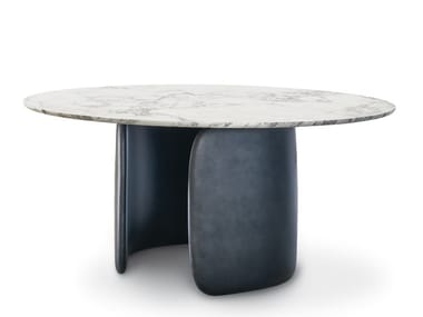 MELLOW - Round table with polyurethane base (Request Info).