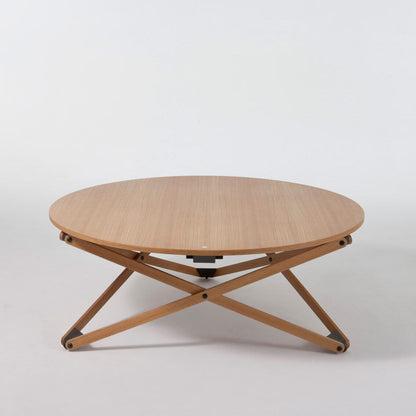 SUBEYBAJA - Height-adjustable round oak coffee table.