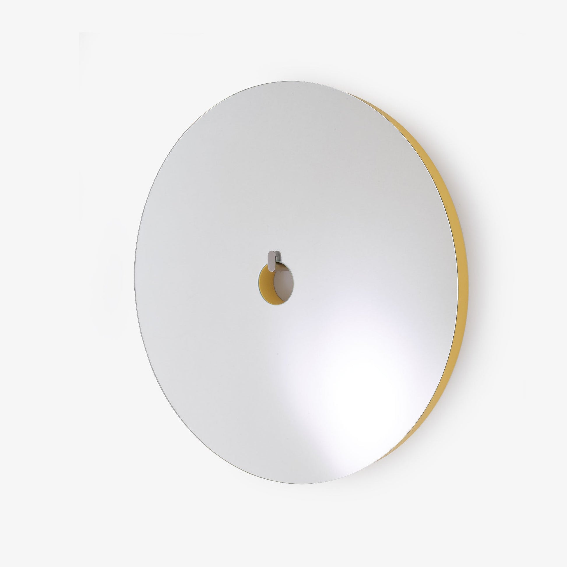 URA - Round wall-mounted mirror.