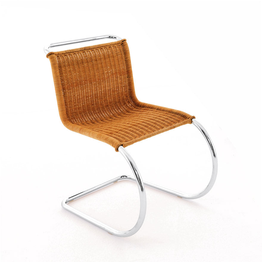 MR - Cantilever rattan armless chair.