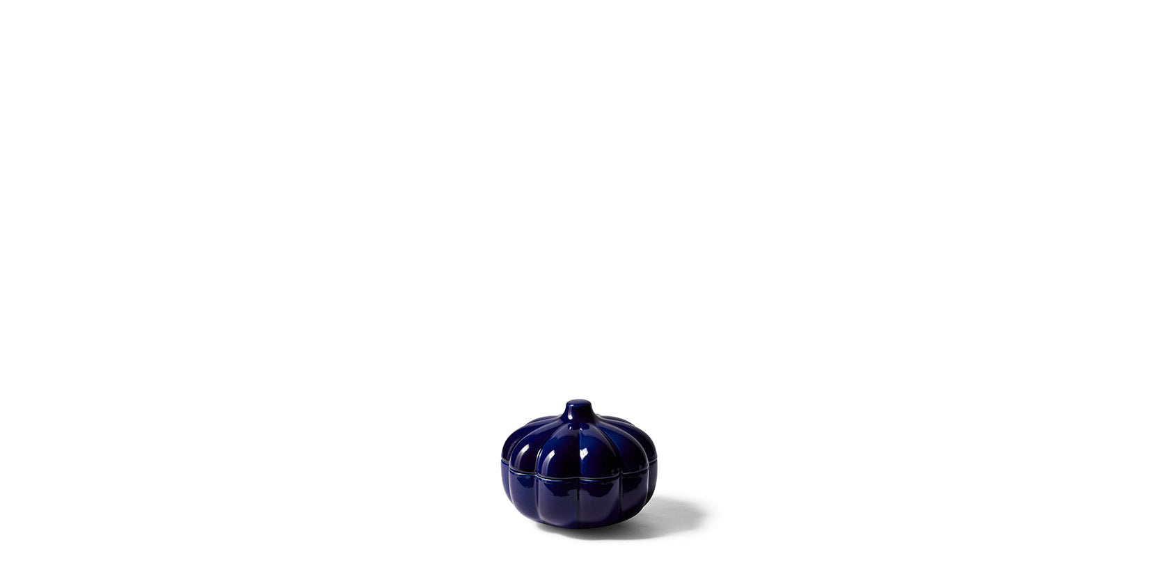 Taac "Pumpkin" - glossy glazed ceramic container.