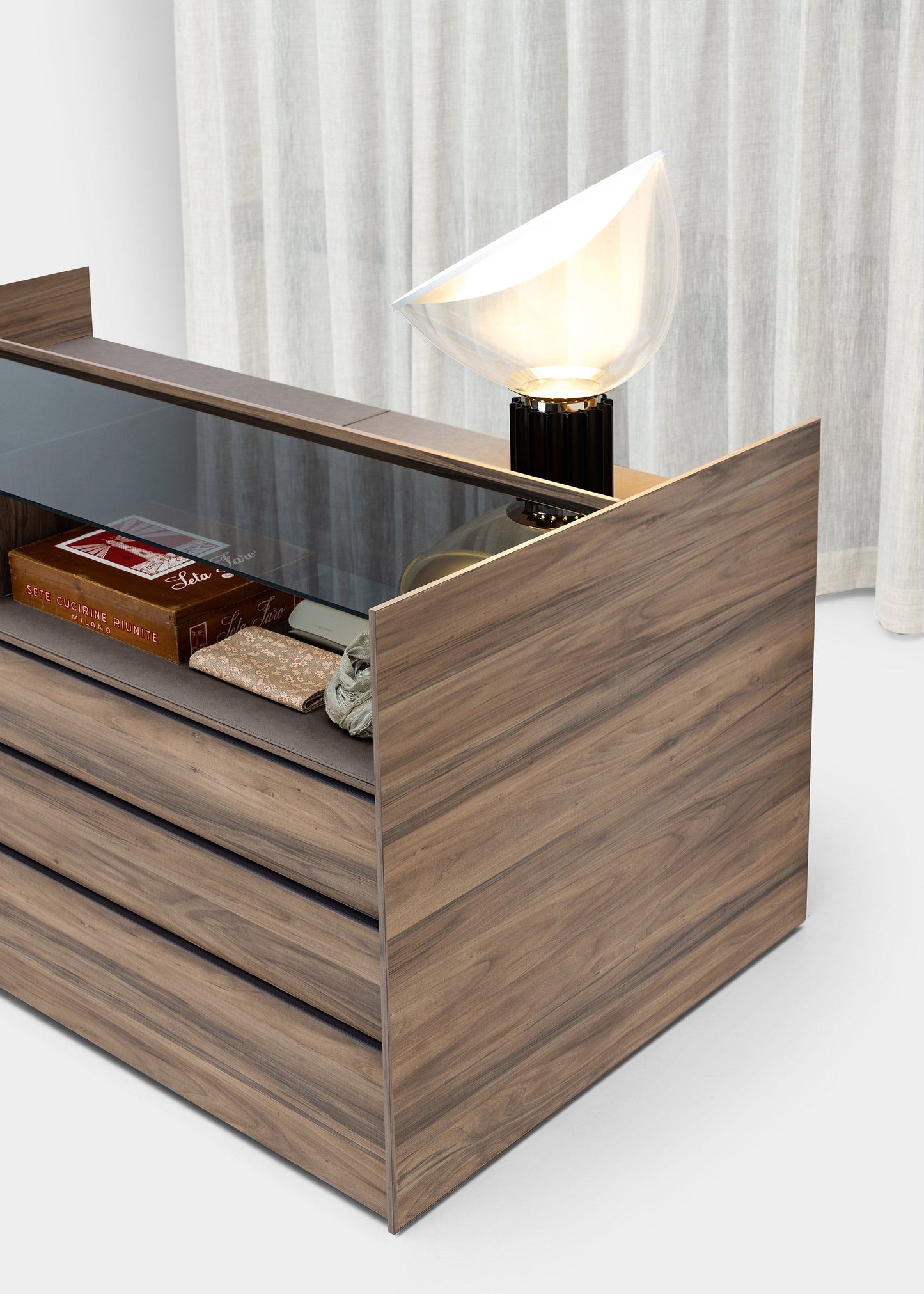 NOVEL ISLAND - Wooden chest of drawers with integrated handles.