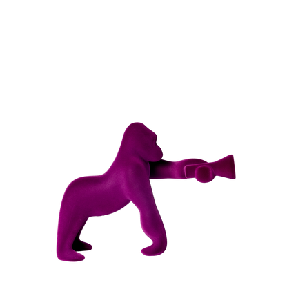 Kong XS Velvet Finish table and a floor lamp