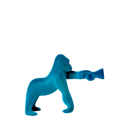 Kong XS Velvet Finish table and a floor lamp