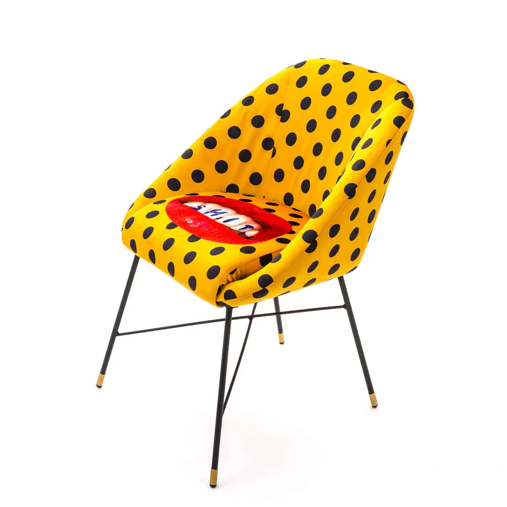 SHIT - Upholstered fabric chair with armrests.