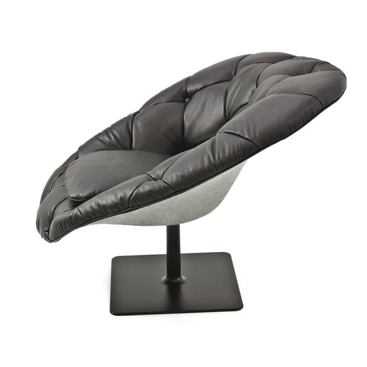 BOHEMIAN - Tufted swivel leather easy chair (Request Info).