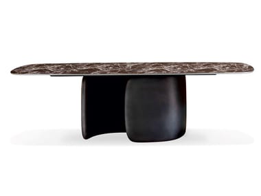 MELLOW - Barrel-shaped dining table.