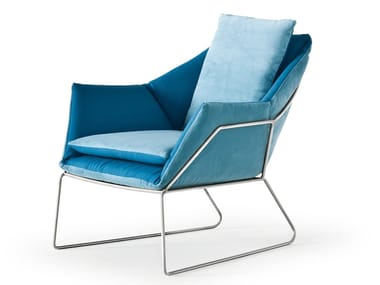 NEW YORK - Sled base fabric armchair with armrests (Request Info).