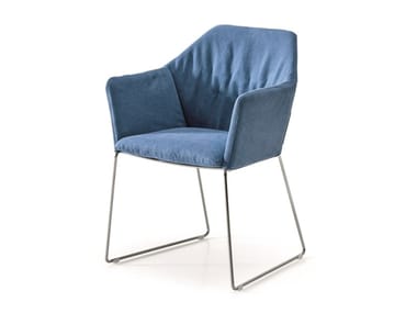 NEW YORK - Upholstered fabric chair with armrests (Request Info).