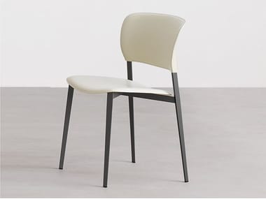 PLY - Upholstered open back tanned leather chair.