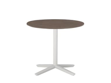 QUATTRO OCCASIONAL TECHNICAL STONE ROUND - Round Techstone coffee table with 4-star base (Request Info).