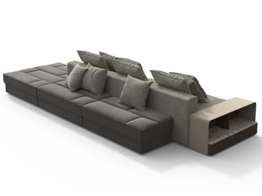 SKYLINE - Sectional fabric sofa with integrated magazine rack (Request Info).