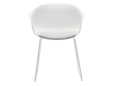 NEXT SO0495 - Sled base chair with armrests with integrated cushion (Request Info).