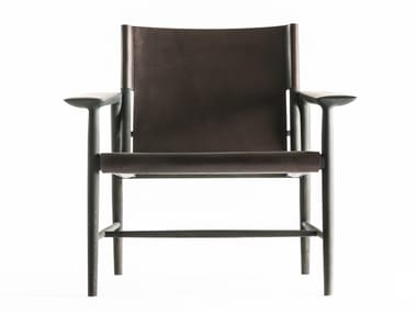 SUNSET - Tanned leather easy chair with armrests (Request Info).